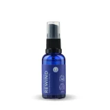 Rewind Detox Spray in a blue glass bottle