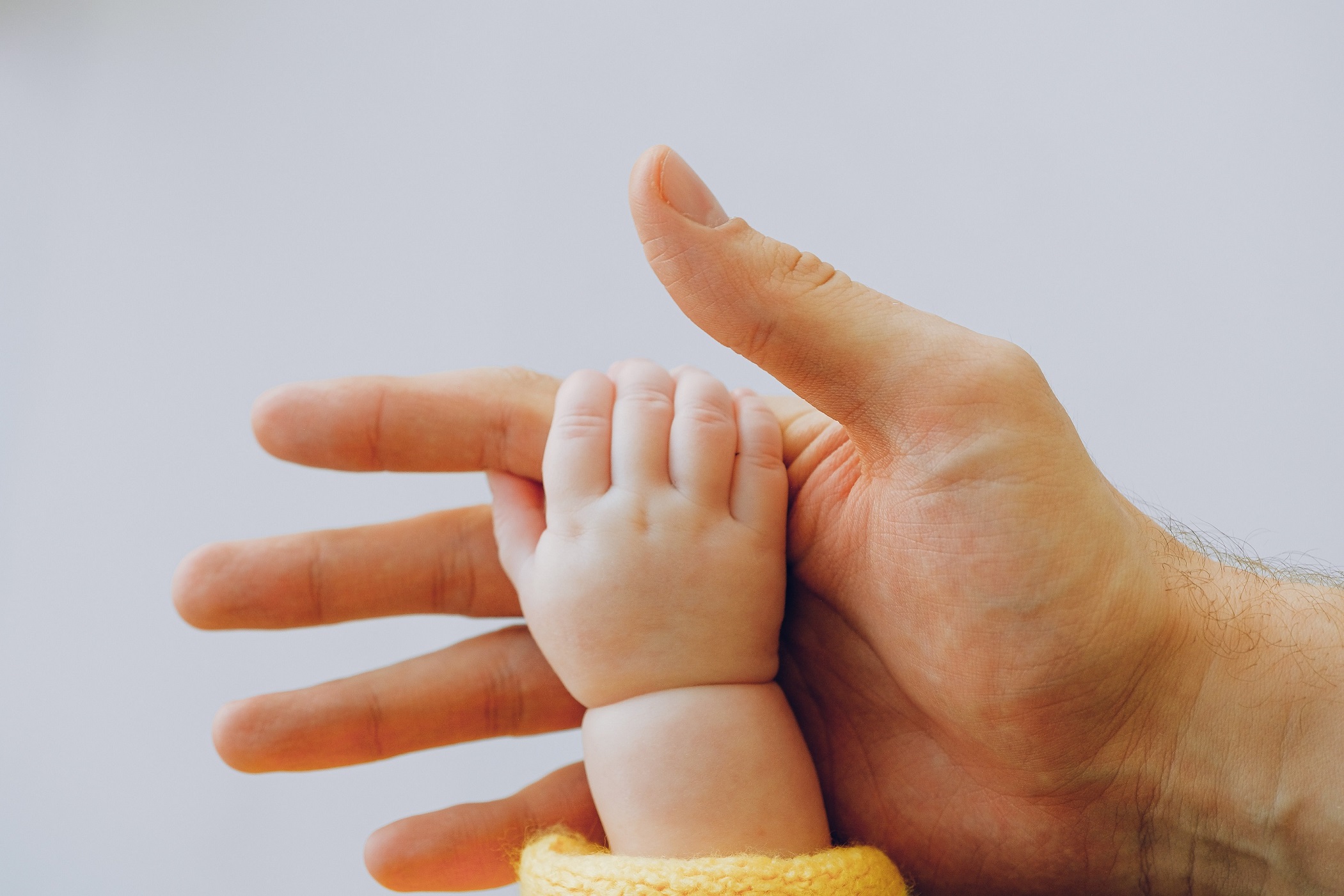 Man and Baby Hands