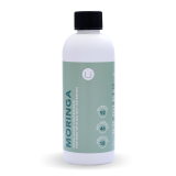 a white bottle with green label 200ml Moringa super liquid concentrate