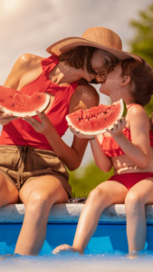 Mother and Child eating watermelon